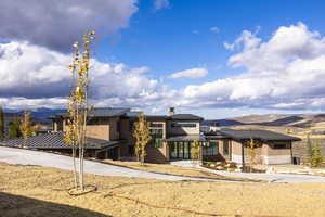 View of front of house with a mountain view