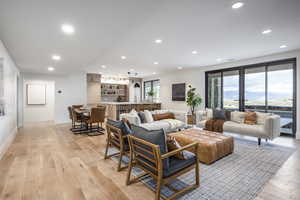 Living room with light wood-type flooring