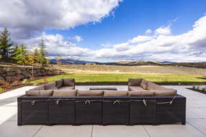 View of patio / terrace featuring outdoor lounge area and a mountain view