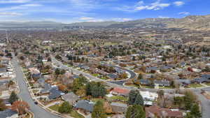 Birds eye view of property with a mountain view