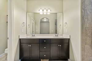 Bathroom with vanity and toilet