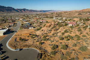 Birds eye view of property with a mountain view