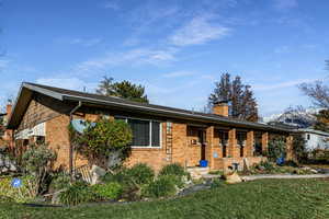 View of front of property with a front lawn