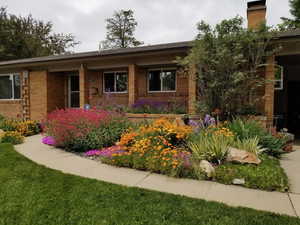 View front home featuring covered porch