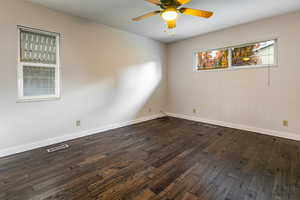 Bedroom room with hardwood  floors and ceiling fan