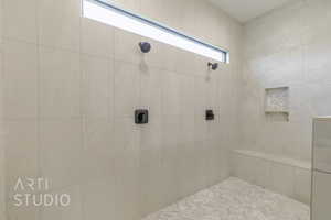 Bathroom with a tile shower