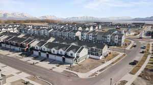 Birds eye view of property with a mountain view