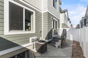 View of patio with cooling unit