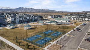 Birds eye view of property with a mountain view