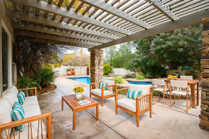 View of patio / terrace featuring an outdoor living space, a pergola, and a fenced in pool