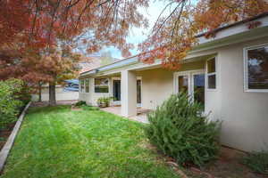 View of yard with a patio area