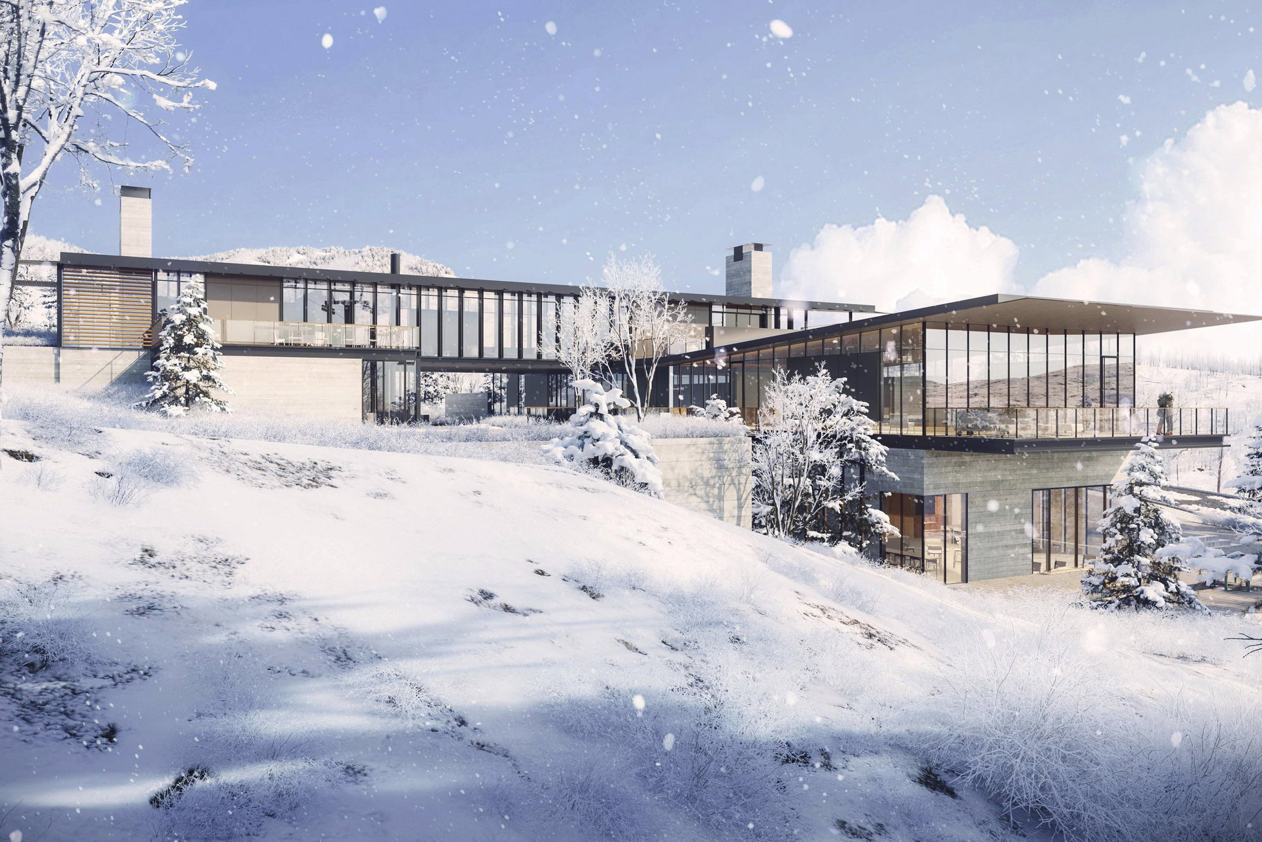 View of snow covered back of property