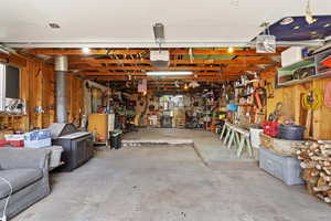 Garage featuring a workshop area