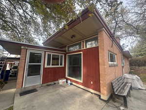 Back of property with a patio area