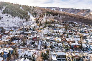 Snowy aerial view with a mountain view