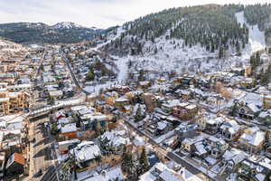 Snowy aerial view with a mountain view