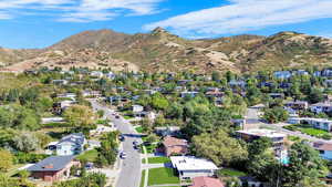 Birds eye view of property with a mountain view