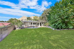 Back of house with a patio area