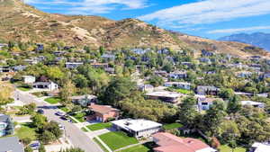 Birds eye view of property with a mountain view