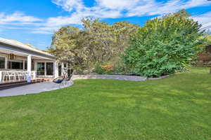 View of backyard featuring a deck/patio area