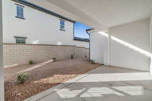 View of property exterior with a patio