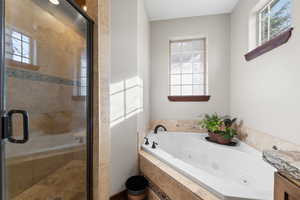 Master Bathroom!  Separate Large Shower w/ Euro Door! Travertine Floors!  Tub Surround & Shower Walls!