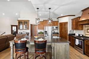 Large Island! Elegant Wood Craftsmanship Throughout!