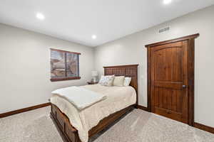 Guest Bedroom w/ Rock Landscape Window Well!  Recessed Lighting!