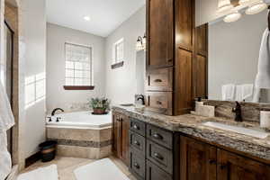 Master Bathroom!  His & Her Vanities! Center Medicine/Storage Cabinet Between!  Corner  Jacuzzi Garden Tub!