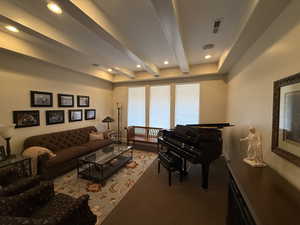 Living room with beamed ceiling