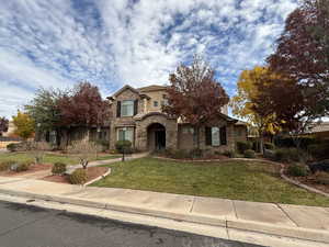 View of front facade with a front lawn