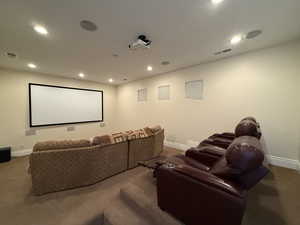 Home theater featuring carpet flooring