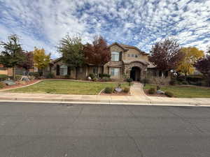 View of front of home featuring a front yard