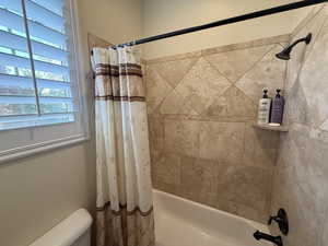 Bathroom featuring shower / bath combo