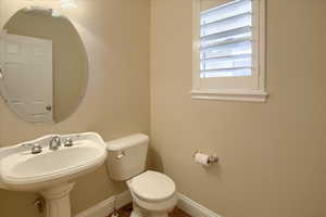 Bathroom with toilet and sink