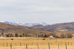 View of mountain feature with a rural view