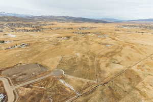 Aerial view with a mountain view and a rural view