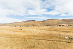 Property view of mountains featuring a rural view