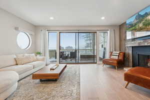 Living room with light wood-type flooring