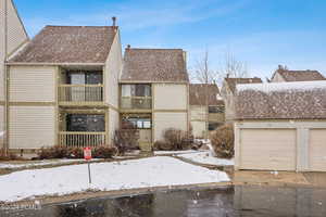 View of front of home with a balcony