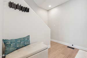 Sitting room with hardwood / wood-style floors