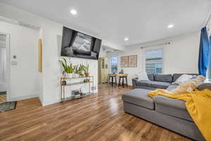 Living room featuring hardwood / wood-style flooring