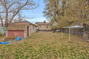 View of yard with a shed