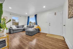 Living room featuring hardwood / wood-style floors