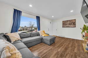 Living room featuring hardwood / wood-style floors