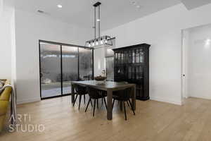 Dining space featuring light hardwood / wood-style floors