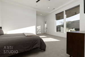 Carpeted bedroom with ceiling fan