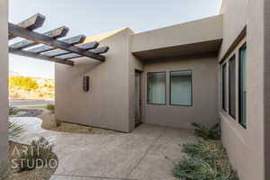 View of property exterior featuring a patio area