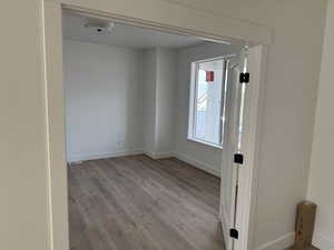 Empty room featuring light hardwood / wood-style floors