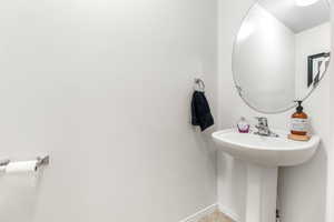 Bathroom with tile patterned floors